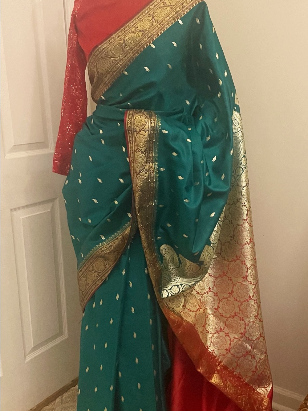 Teal Silk Saree with Gold Brocade Border and Red Pallu